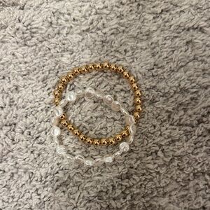Woman's beaded bracelet gold/white dress